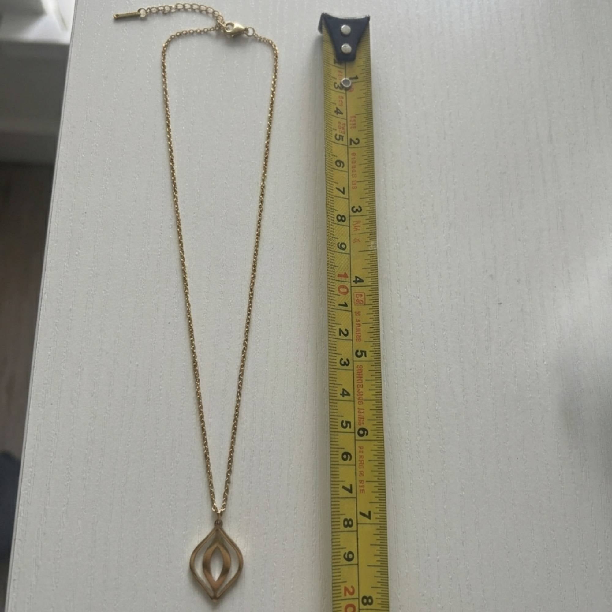 Vulva Kette Gold mit Maßband