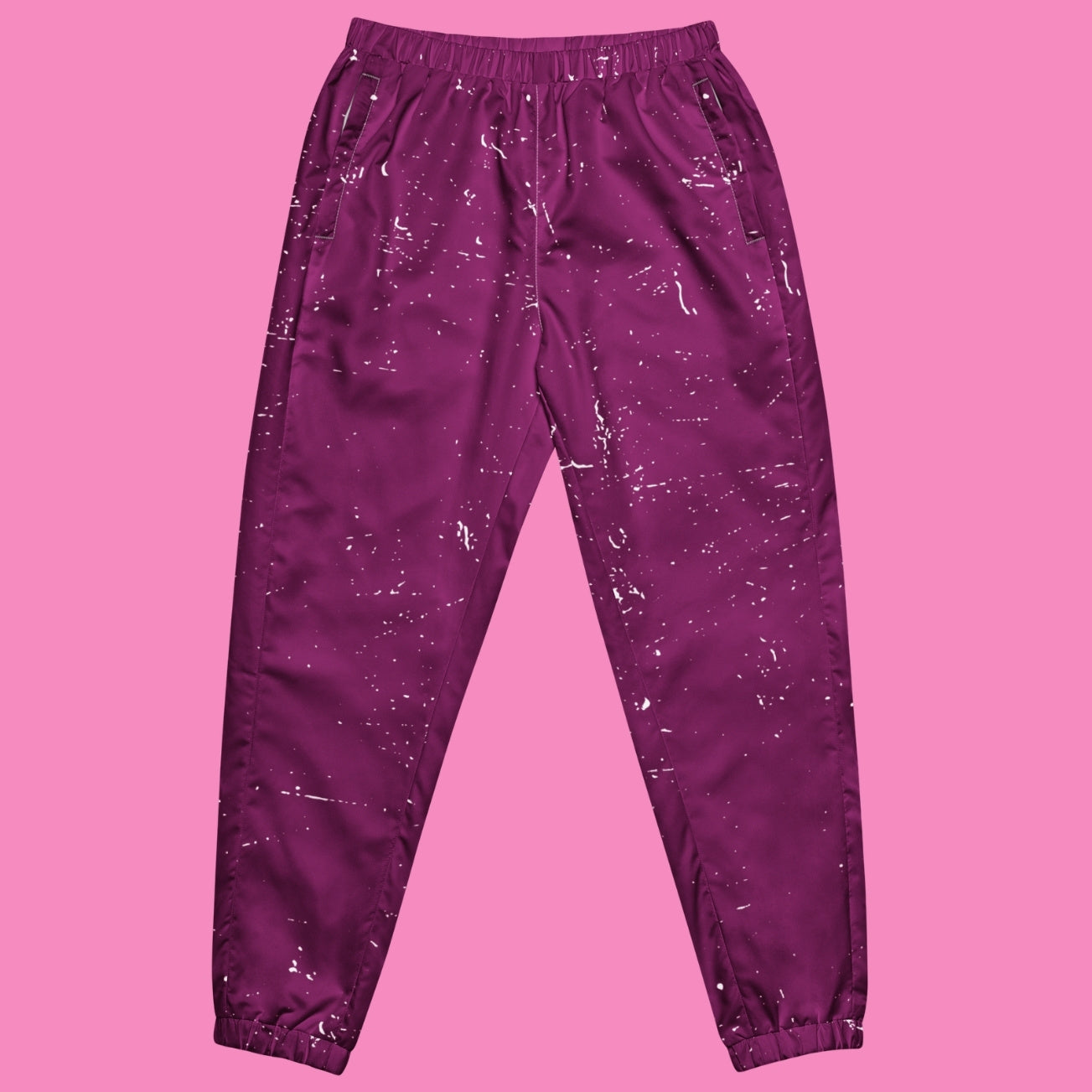 Feministische Trainingshose in Pink und Lila mit All-Over-Print – leichte Jogginghose aus Polyester – Bling Bling Feministas